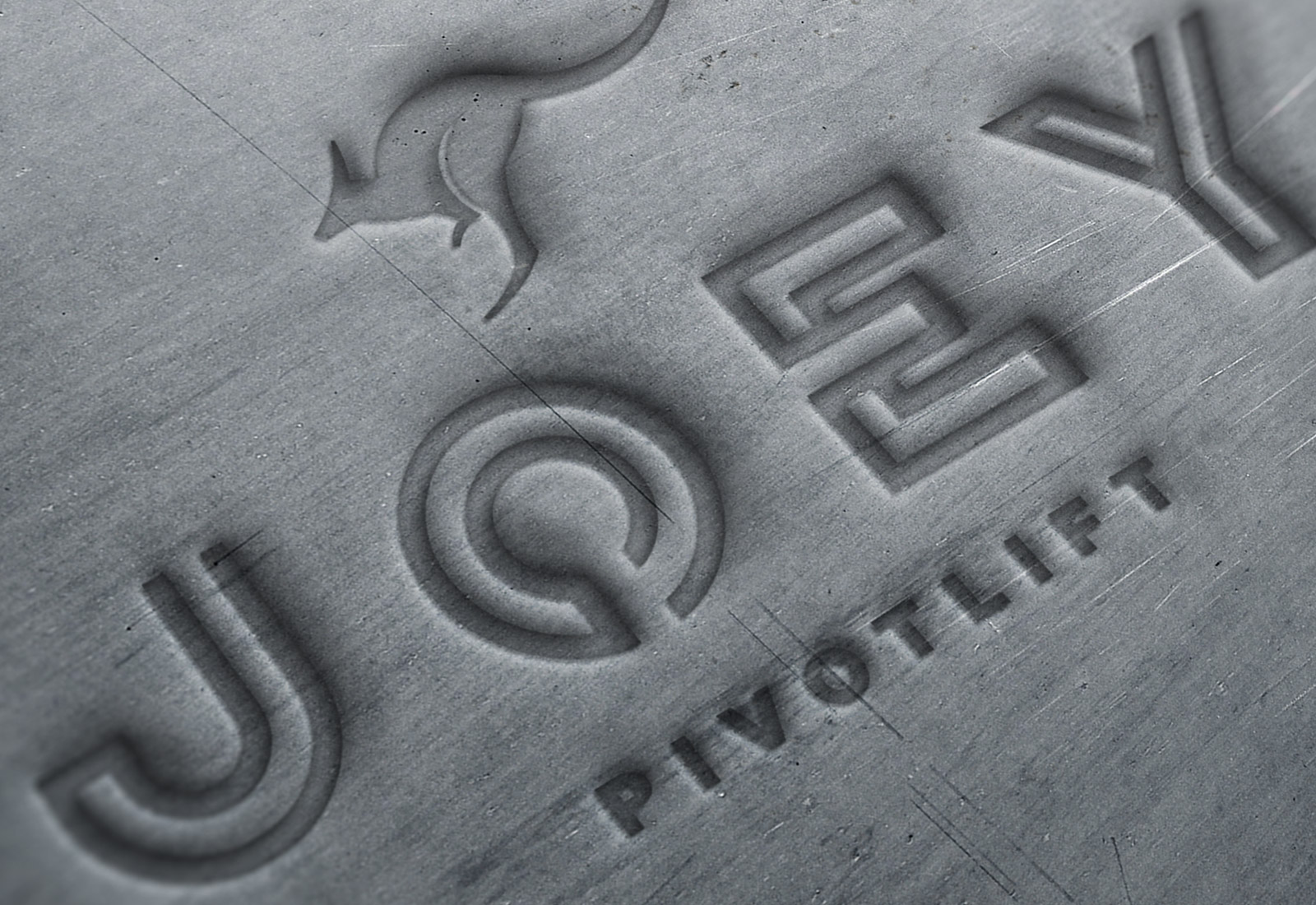 Joey PivotLift logo pressed into wood demonstrating product branding