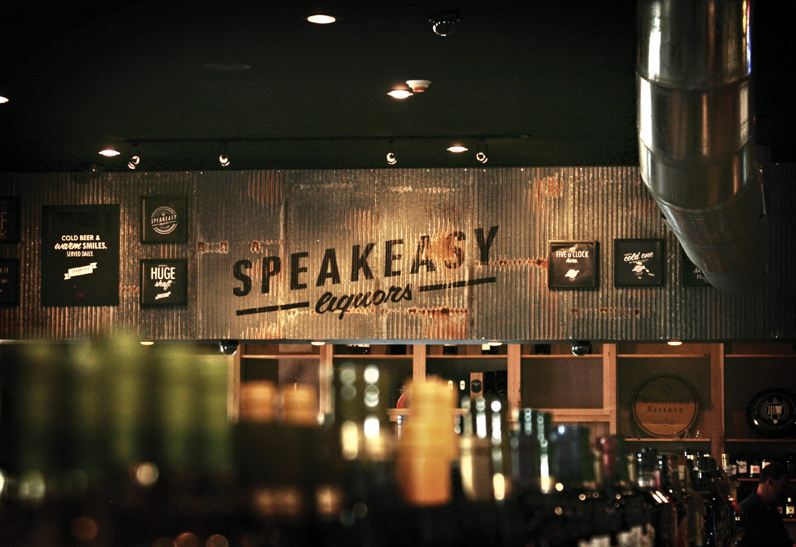 Speakeasy Liquors interior highlighting retail branding and merchandise displays