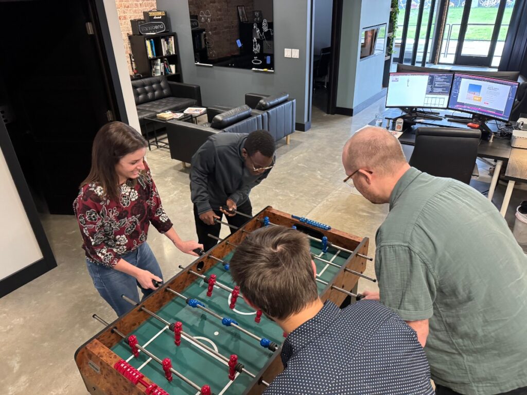Team foosball games happen regularly on Fridays