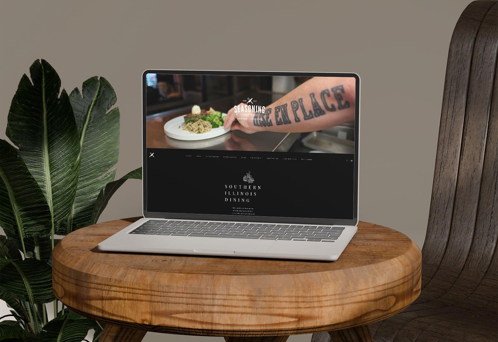 Seasoning Bistro restaurant website design displayed on laptop