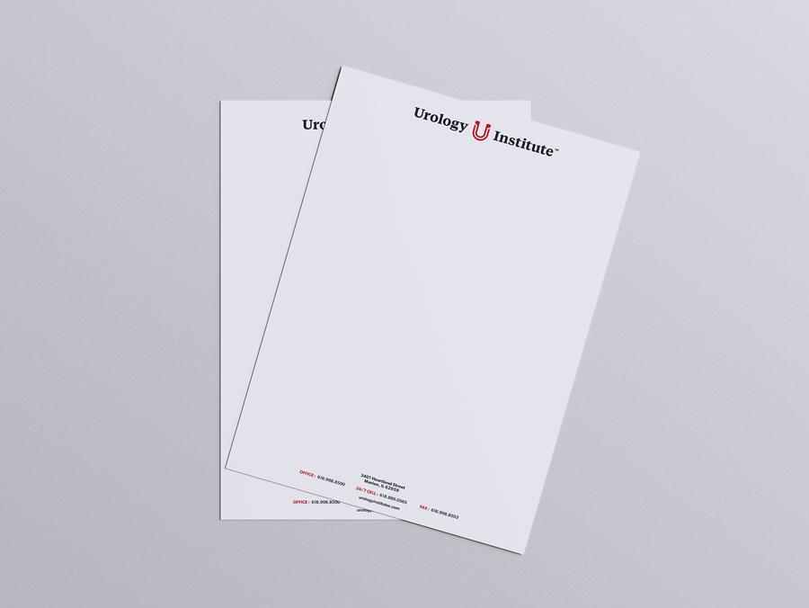 The Urology Institute branded notepads reflecting healthcare branding